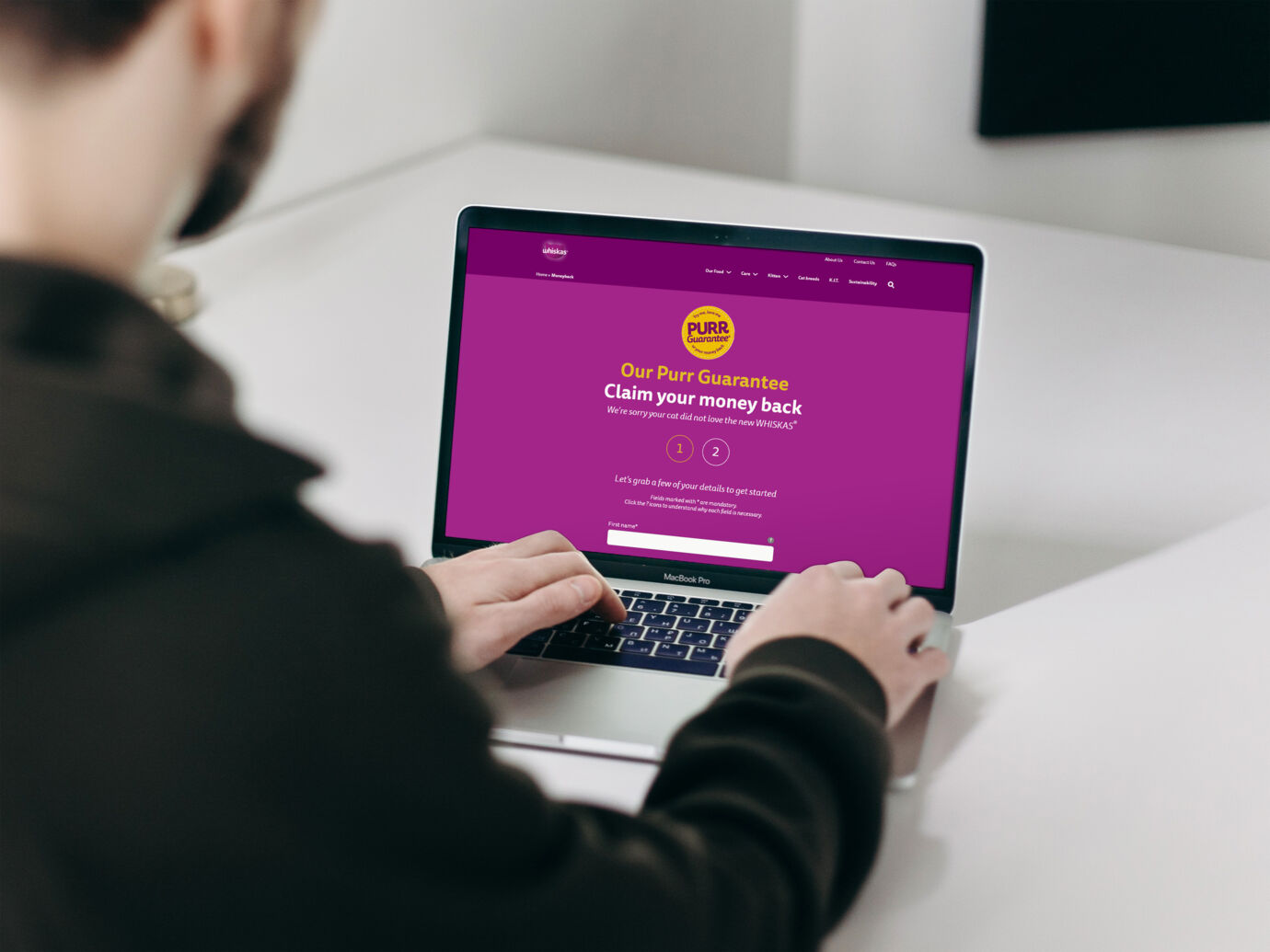Free Man Using MacBook Pro Mockup@2x Free Man Using MacBook Pro Mockup@2x